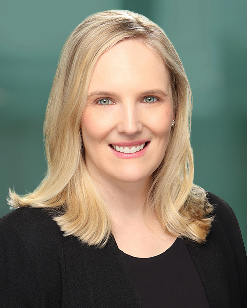 Portrait of Amy Enright wearing a dark sweater